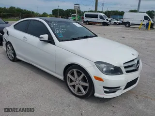 2013 Mercedes-Benz C-Class C 250 with VIN WDDGJ4HB7DG050891, listed as a IAAI auction lot 39092790 with 105,411 mi miles. Bid and sale history available at carsss.com. Image 1.