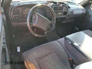 1999 Dodge 1500 with VIN 3B7HC12Y8XG208040, listed as a Copart auction lot 86807104 with 387,576 mi miles and Salvage Title. Bid and sale history available at DreamBid. Image 8.