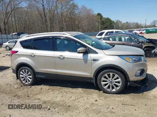 2017 Ford Escape Titanium with VIN 1FMCU9JD3HUC90273, listed as a IAAI auction lot 41828236 with 71,351 mi miles. Bid and sale history available at carsss.com. Image 12.