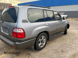 2001 Lexus LX 470 z VIN JTJHT00W313508801, wystawiony jako Copart lot #60938545 z przebiegiem 118 013 mil mil oraz Czysty tytuł • Clean title. Historia ofert i sprzedaży dostępna na DreamBid. Obrazek 4.