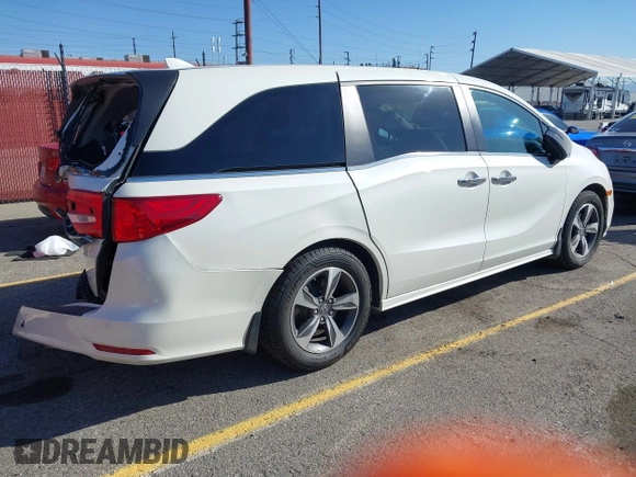 2018 Honda Odyssey Touring with VIN 5FNRL6H8XJB019122, listed as a IAAI auction lot 41820212 with 144,014 mi miles. Bid and sale history available at carsss.com. Image 4.