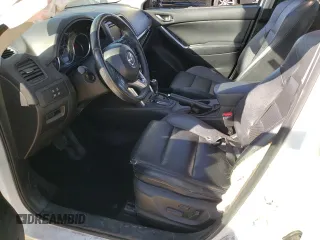 2014 Mazda CX-5 Grand Touring with VIN JM3KE4DY6E0376413, listed as a Copart auction lot 53204935 with 126,791 mi miles and Salvage Title. Bid and sale history available at DreamBid. Image 7.
