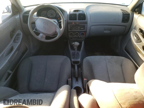 2004 Hyundai Accent GL with VIN KMHCG35C44U284868, listed as a Copart auction lot 74054884 with 87,259 mi miles and Clean Title. Bid and sale history available at carsss.com. Image 8.