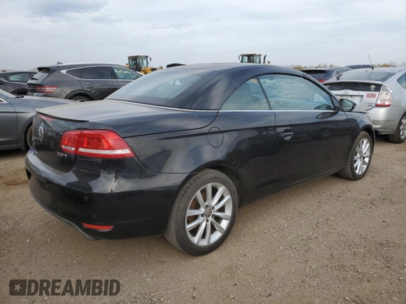 2015 Volkswagen Eos Komfort with VIN WVWBW8AH4FV001321, listed as a Copart auction lot 78718404 with 73,296 mi miles and Salvage Title. Bid and sale history available at DreamBid. Image 3.