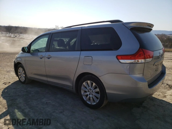 2012 Toyota Sienna LE with VIN 5TDJK3DC1CS031232, listed as a Copart auction lot 48513715 with 214,353 mi miles and Salvage Title. Bid and sale history available at carsss.com. Image 2.