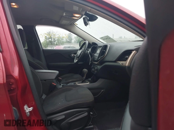 2016 Jeep Cherokee Latitude z VIN 1C4PJMCB4GW206011, wystawiony jako IAAI lot #42354190 z przebiegiem 123 474 mil mil oraz . Historia ofert i sprzedaży dostępna na DreamBid. Obrazek 5.