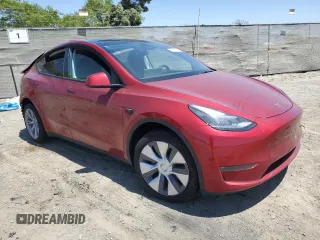 2024 Tesla Model Y Long Range with VIN 7SAYGDEE8RA233147, listed as a Copart auction lot 56695545 with 9,512 mi miles and Salvage title. Bid and sale history available at DreamBid. Image 4.
