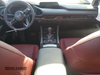 2024 Mazda 3 S Carbon Edition with VIN JM1BPBLM4R1714705, listed as a Copart auction lot 69140474 with 1,808 mi miles and Salvage Title. Bid and sale history available at DreamBid. Image 8.