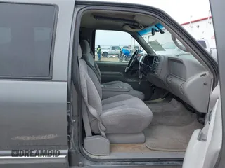 1999 GMC Yukon with VIN 1GKEK13R0XJ803237, listed as a IAAI auction lot 41736117 with 295,793 mi miles. Bid and sale history available at carsss.com. Image 5.