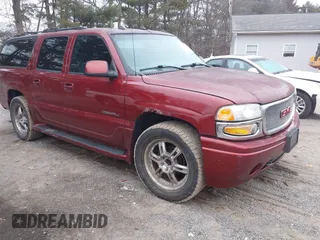 2003 GMC Yukon XL Denali with VIN 1GKFK66U43J326436, listed as a IAAI auction lot 41559845 with 212,457 mi miles. Bid and sale history available at carsss.com. Image 1.