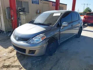 2011 Nissan Versa 1.8 SL with VIN 3N1BC1CP7BL446671, listed as a IAAI auction lot 42003858 with 96,939 mi miles. Bid and sale history available at carsss.com. Image 17.