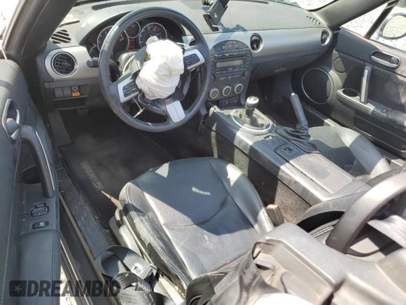 2010 Mazda MX-5 Miata Grand Touring with VIN JM1NC2FF5A0205190, listed as a Copart auction lot 61372455 with 147,852 mi miles and Salvage title. Bid and sale history available at DreamBid. Image 8.