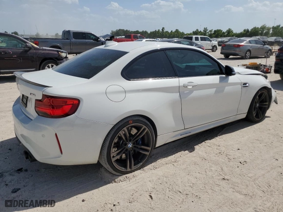 2018 BMW M2 with VIN WBS1J5C51JVD36522, listed as a Copart auction lot 61423854 with 57,933 mi miles and Salvage Title. Bid and sale history available at carsss.com. Image 3.