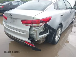 2016 Kia Optima LX z VIN 5XXGT4L37GG010780, wystawiony jako IAAI lot #42320573 z przebiegiem 154 662 mil mil oraz . Historia ofert i sprzedaży dostępna na DreamBid. Obrazek 17.