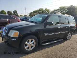2006 GMC Envoy SLT with VIN 1GKDT13S862238613, listed as a Copart auction lot 70585704 with 147,337 mi miles and Salvage Title. Bid and sale history available at carsss.com. Image 1.