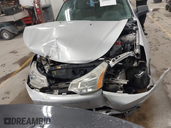 2009 Ford Focus S with VIN 1FAHP34N99W107098, listed as a IAAI auction lot 41610814 with 80,428 mi miles. Bid and sale history available at carsss.com. Image 12.