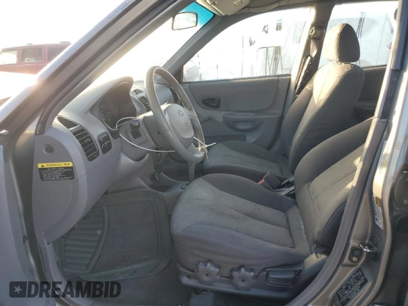 2005 Hyundai Accent GLS with VIN KMHCG45C95U592609, listed as a Copart auction lot 79048224 with 138,738 mi miles and Salvage Title. Bid and sale history available at carsss.com. Image 7.