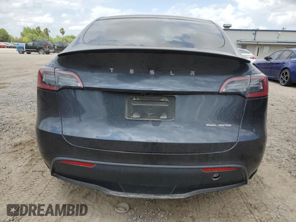 2024 Tesla Model Y Long Range with VIN 7SAYGDEE4RA316722, listed as a Copart auction lot 53207395 with 17,006 mi miles and Salvage title. Bid and sale history available at DreamBid. Image 6.