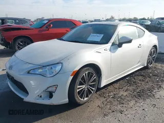 2016 Scion FR-S with VIN JF1ZNAA17G9707484, listed as a IAAI auction lot 41857022 with 53,431 mi miles. Bid and sale history available at carsss.com. Image 2.