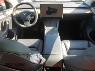 2024 Tesla Model Y with VIN 7SAYGDED7RF056973, listed as a Copart auction lot 55310705 with 15,391 mi miles and Salvage Title. Bid and sale history available at DreamBid. Image 8.