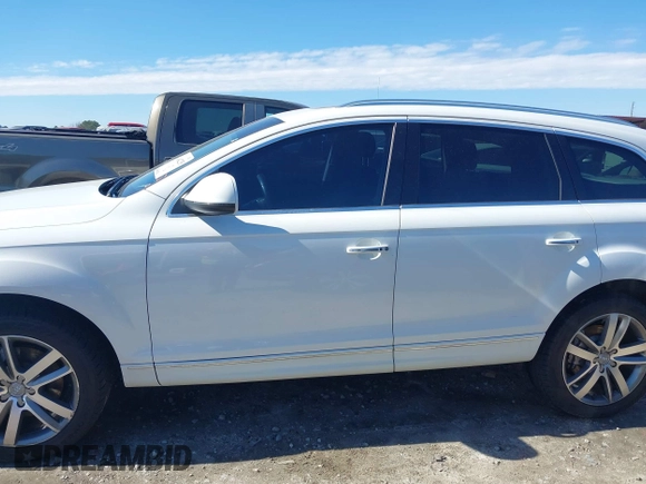 2015 Audi Q7 Premium Plus with VIN WA1LMAFE7FD022860, listed as a IAAI auction lot 41642235 with 202,624 mi miles and . Bid and sale history available at DreamBid. Image 14.