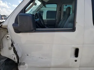 2009 Ford Econoline Passenger XL with VIN 1FBSS31L99DA06824, listed as a Copart auction lot 73740824 with 147,528 mi miles and Salvage title. Bid and sale history available at DreamBid. Image 7.