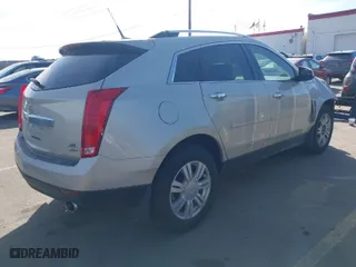 2013 Cadillac SRX Luxury Collection with VIN 3GYFNGE37DS640593, listed as a IAAI auction lot 41760062 with 117,027 mi miles. Bid and sale history available at carsss.com. Image 4.