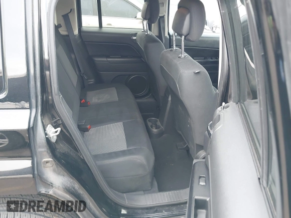 2012 Jeep Patriot Sport with VIN 1C4NJRBB7CD636000, listed as a IAAI auction lot 42106629 with 143,958 mi miles. Bid and sale history available at carsss.com. Image 8.