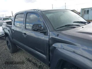 2013 Toyota Tacoma with VIN 3TMLU4ENXDM105967, listed as a IAAI auction lot 41819211 with 121,012 mi miles and . Bid and sale history available at DreamBid. Image 12.