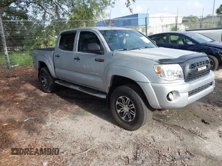 2005 Toyota Tacoma PreRunner z VIN 3TMJU62N15M003398, wystawiony jako IAAI lot #42490056 z przebiegiem 246 125 mil mil oraz . Historia ofert i sprzedaży dostępna na DreamBid. Obrazek 1.