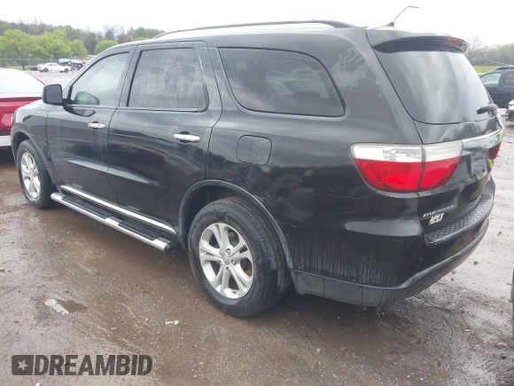 2013 Dodge Durango Crew with VIN 1C4RDHDG5DC613835, listed as a IAAI auction lot 41910643 with 155,827 mi miles and . Bid and sale history available at DreamBid. Image 3.