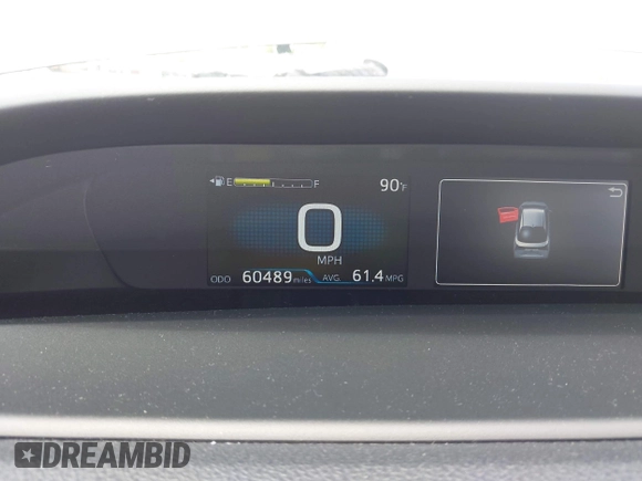 2021 Toyota Prius L Eco z VIN JTDKAMFU3M3152785, wystawiony jako IAAI lot #42501351 z przebiegiem 60 489 mil mil oraz . Historia ofert i sprzedaży dostępna na DreamBid. Obrazek 7.