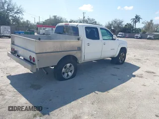2014 Toyota Tacoma PreRunner with VIN 3TMJU4GN2EM169071, listed as a IAAI auction lot 41543601 with 304,594 mi miles. Bid and sale history available at carsss.com. Image 4.