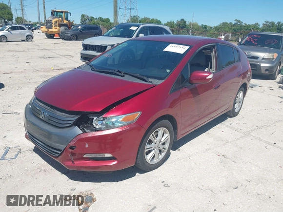 2010 Honda Insight EX with VIN JHMZE2H71AS021062, listed as a IAAI auction lot 41857350 with 45,558 mi miles and . Bid and sale history available at carsss.com. Image 18.