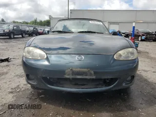 2005 Mazda MX-5 Miata LS with VIN JM1NB353X50410655, listed as a Copart auction lot 63337515 with 118,409 mi miles and Clean title. Bid and sale history available at DreamBid. Image 5.