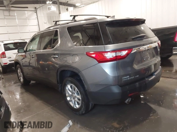 2020 Chevrolet Traverse LT with VIN 1GNEVHKW9LJ176834, listed as a IAAI auction lot 42211350 with 100,188 mi miles and . Bid and sale history available at DreamBid. Image 3.