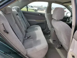 2003 Toyota Camry LE z VIN 4T1BF32K13U554339, wystawiony jako Copart lot #55972595 z przebiegiem 69 549 mil mil oraz Szkoda całkowita • Salvage title. Historia ofert i sprzedaży dostępna na DreamBid. Obrazek 10.