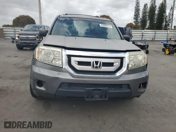 2009 Honda Pilot LX with VIN 5FNYF382X9B028461, listed as a Copart auction lot 52068575 with 189,267 mi miles and Salvage title. Bid and sale history available at DreamBid. Image 5.