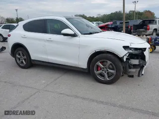 2018 Alfa Romeo Stelvio with VIN ZASFAKAN9J7B73870, listed as a IAAI auction lot 41341576 with 100,041 mi miles. Bid and sale history available at carsss.com. Image 1.