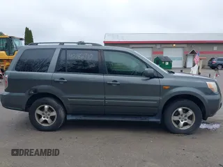 2007 Honda Pilot EX-L with VIN 2HKYF18667H526601, listed as a IAAI auction lot 42182710 with 221,948 mi miles and . Bid and sale history available at carsss.com. Image 14.