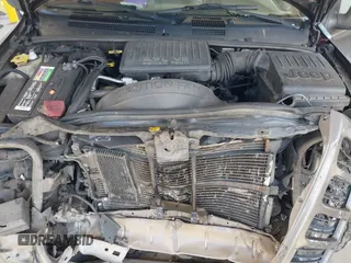 1999 Jeep Grand Cherokee Limited z VIN 1J4GW68N0XC512229, wystawiony jako IAAI lot #42189815 z przebiegiem 230 028 mil mil oraz . Historia ofert i sprzedaży dostępna na DreamBid. Obrazek 10.