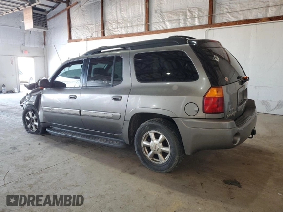 2004 GMC Envoy SLT with VIN 1GKET16S146222288, listed as a Copart auction lot 49316405 with 210,424 mi miles and Salvage Title. Bid and sale history available at DreamBid. Image 2.