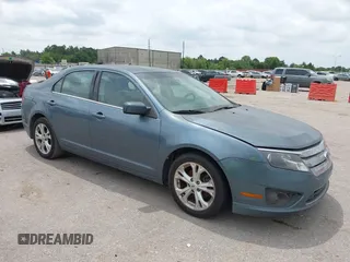 2012 Ford Fusion SE z VIN 3FAHP0HA8CR367444, wystawiony jako IAAI lot #42437240 z przebiegiem 123 409 mil mil oraz . Historia ofert i sprzedaży dostępna na DreamBid. Obrazek 1.