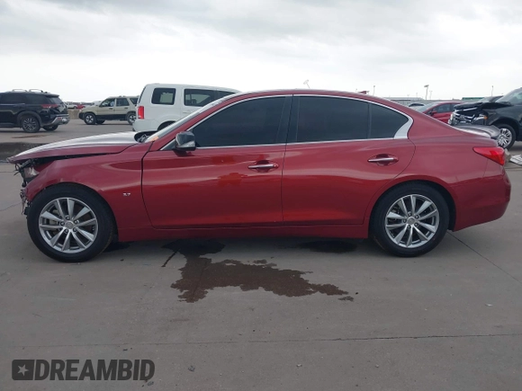 2014 Infiniti Q50 Premium z VIN JN1BV7AP8EM673359, wystawiony jako IAAI lot #42300427 z przebiegiem 118 779 mil mil oraz . Historia ofert i sprzedaży dostępna na DreamBid. Obrazek 14.