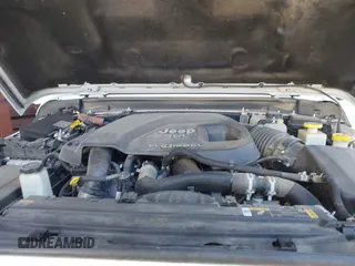 2022 Jeep Gladiator Rubicon with VIN 1C6JJTBM6NL145009, listed as a IAAI auction lot 42134143 with 59,438 mi miles and . Bid and sale history available at DreamBid. Image 10.