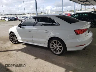 2016 Audi A3 2.0T Premium Plus with VIN WAUJ8GFF4G1069082, listed as a Copart auction lot 50992205 with 72,125 mi miles and Salvage Title. Bid and sale history available at carsss.com. Image 2.