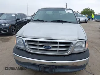 2000 Ford F-150 XL with VIN 1FTRX17W0YKA70861, listed as a IAAI auction lot 42096438 with 1 mi miles. Bid and sale history available at carsss.com. Image 12.