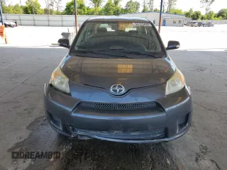 2009 Scion xD z VIN JTKKU10419J046166, wystawiony jako Copart lot #56123435 z przebiegiem 184 030 mil mil oraz Szkoda całkowita • Salvage title. Historia ofert i sprzedaży dostępna na DreamBid. Obrazek 5.