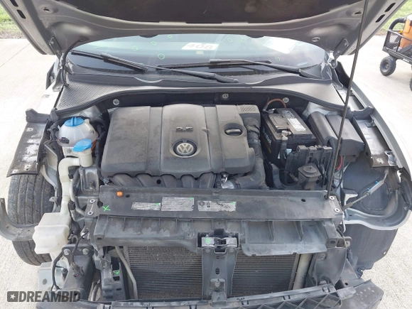 2013 Volkswagen Passat SE with VIN 1VWBP7A38DC086021, listed as a IAAI auction lot 41912361 with 215,843 mi miles. Bid and sale history available at carsss.com. Image 10.