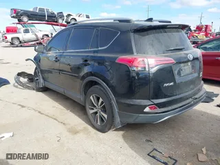 2017 Toyota RAV4 XLE with VIN 2T3RFREV9HW567801, listed as a IAAI auction lot 41053316 with 103,267 mi miles. Bid and sale history available at carsss.com. Image 3.